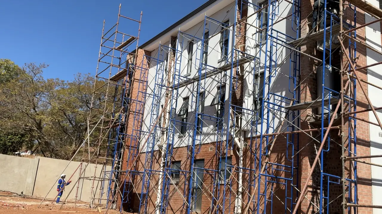 Commercial construction Harare — multi-storey development with full scaffold access during construction in Zimbabwe