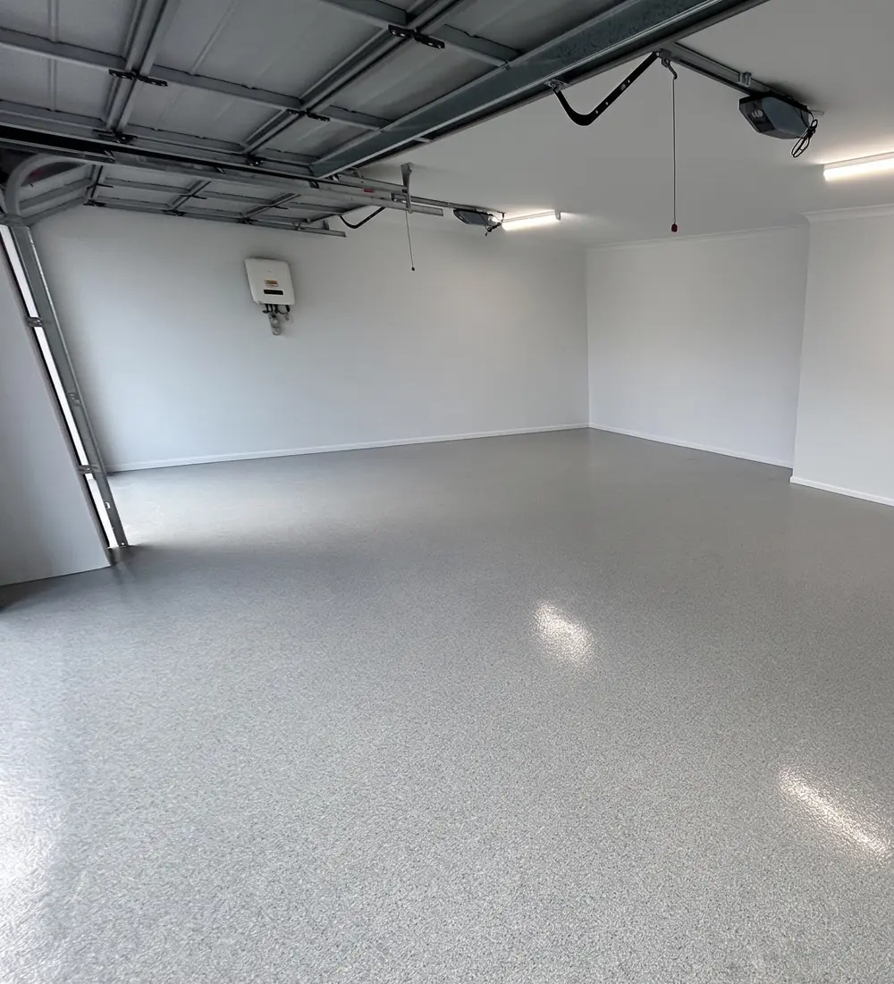 Epoxy flake garage flooring Harare — decorative flake resin floor installed in a Highlands residential garage