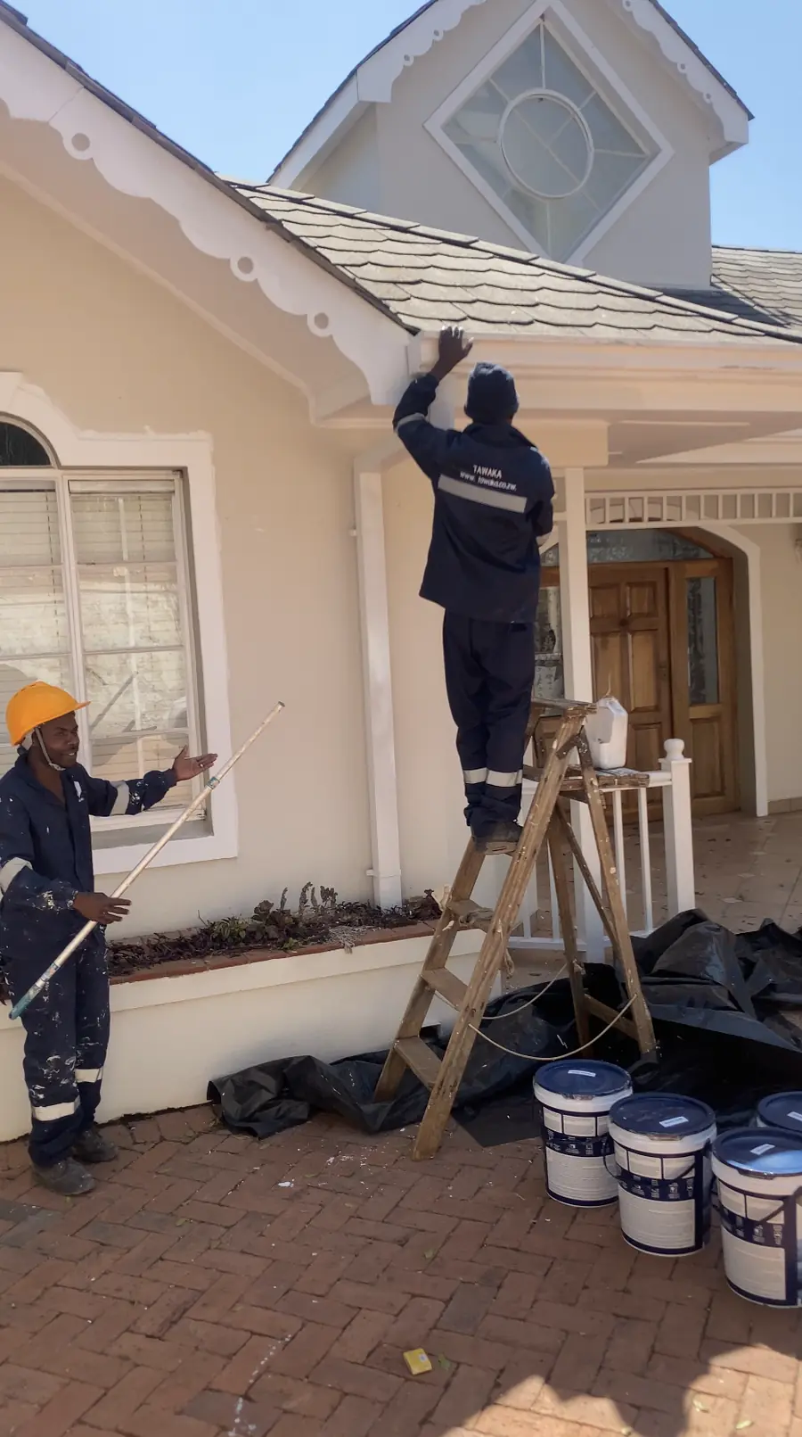 House painters Harare — Tawaka Contracting crew preparing and painting the exterior of a residential property in Highlands