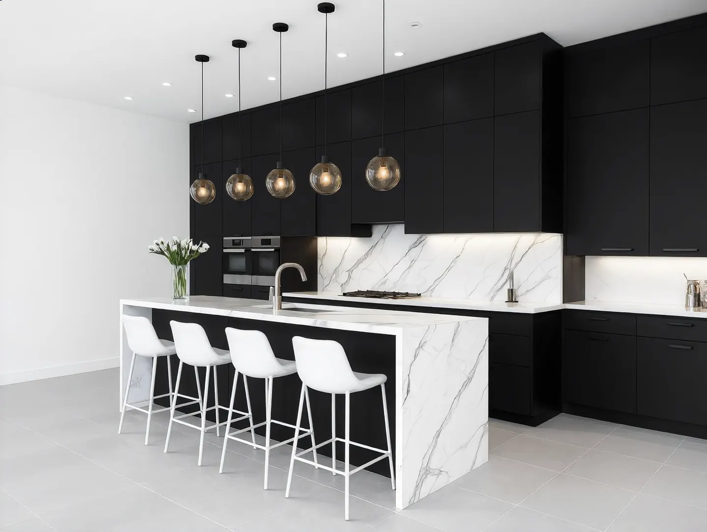 Kitchen renovation Harare — completed matt black and marble kitchen with island, fitted by Tawaka Contracting in Zimbabwe