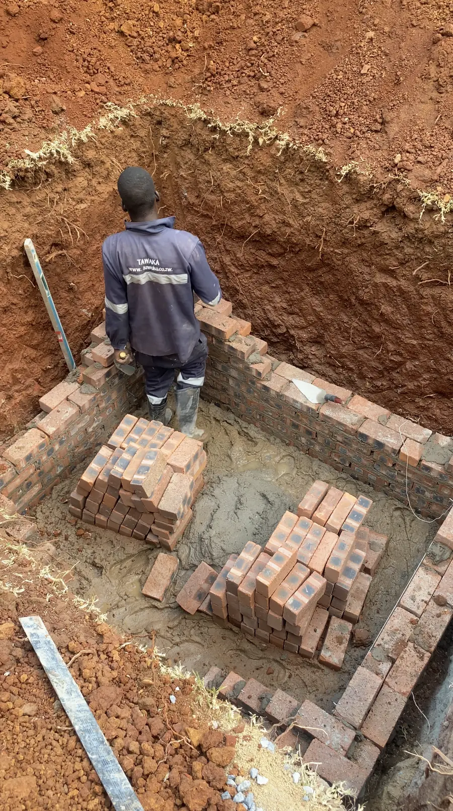 Groundworks and drainage Harare — Tawaka Contracting building a brick septic tank in excavation in Greendale, Zimbabwe